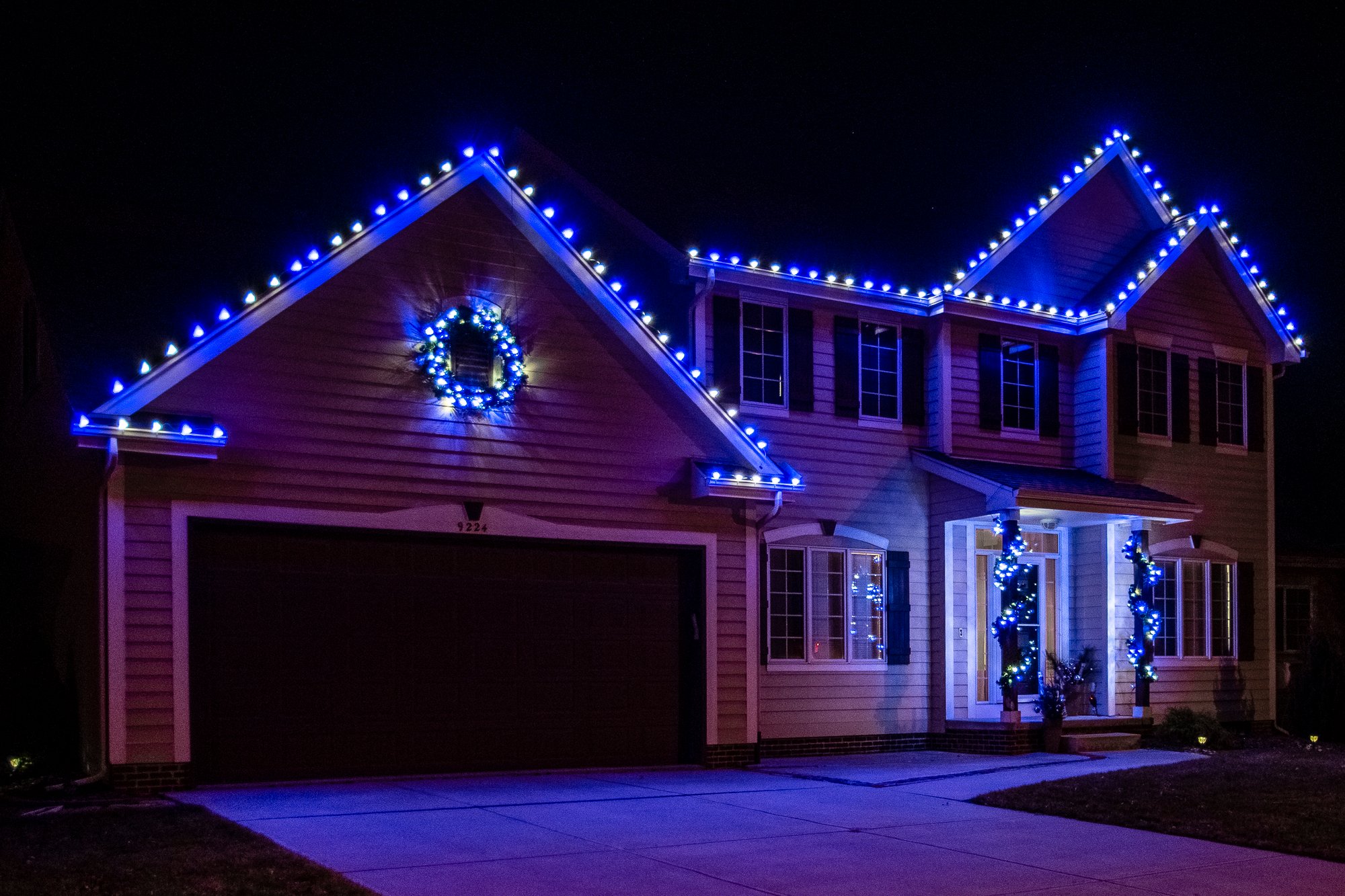 holiday-christmas-house-blue-yellow-lights